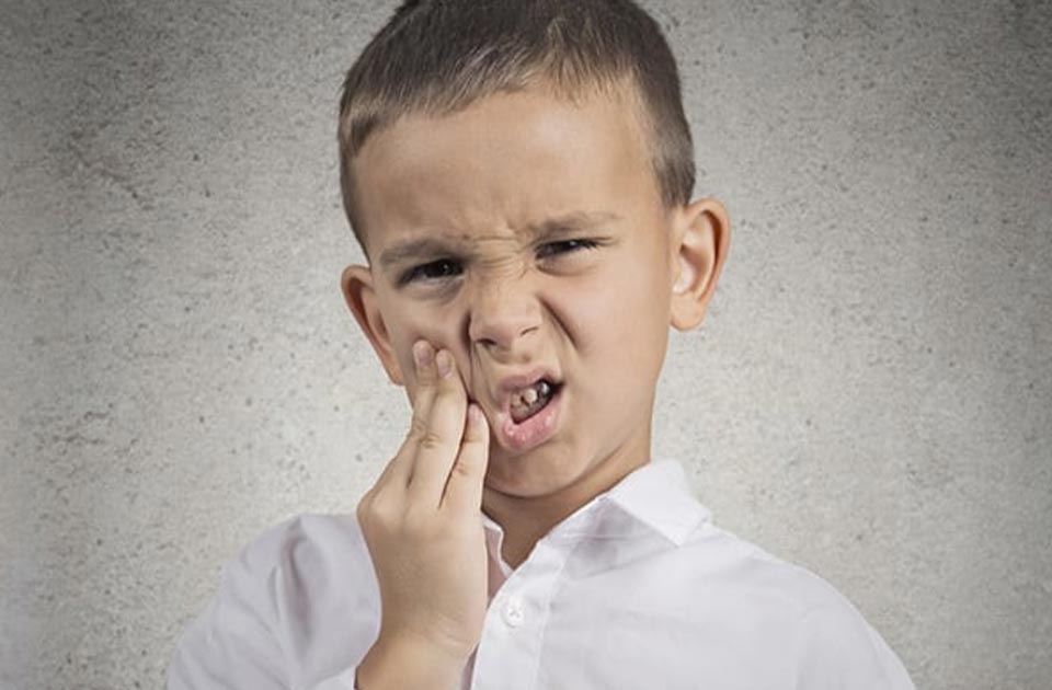 عوارض و درد عصب کشی دندان شیری