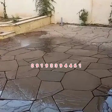 ساخت رمپ ورودی. پارکینگ با سنگهای. طبیعی لاشه سنگ. پیمانکاری سنگ لاشه 